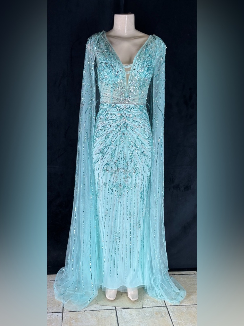 Elegant Beaded Aqua Evening Gown with Sheer Cape Sleeves